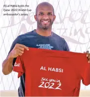  ??  ?? Ali al Habsi holds the Qatar 2022 World Cup ambassador’s jersey