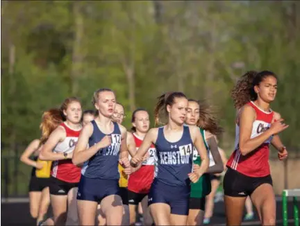  ?? MICHAEL JOHNSON — THE NEWS-HERALD ?? Chardon’s Denali Selent leads 1,600 with Kenston’s Ellie Pleune in pursuit May 10 during the WRC meet at Mayfield.