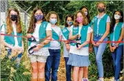  ?? COURTESY ?? Decatur Junior Girl Scouts Troop 16307, including Lucy Hutcheson (from left), Hannah Hughes, Cara Mullins, Mallory Harry, Norah Fonder-Kristy, Kate Morris, Claire McEnaney and Samantha Hill, earned a Bronze Award by planting a zoo garden at Frazier-Rowe Park.