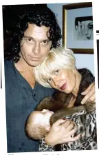  ??  ?? Glamorous: Hutchence, Yates and a tiny Tiger Lily