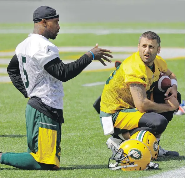  ?? —POSTMEDIA NEWS FILES ?? Edmonton Eskimos running back Travon Van, left, will be quarterbac­k Mike Reilly’s right-hand man in the backfield with John White out for the season with a knee injury. Reilly says he’s excited to work with the ex-Redblack, who ‘we can do a lot of...