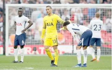  ?? — Reuters photo ?? Tottenham’s Michel Vorm and Dele Alli after the match.