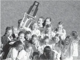  ?? STEPHEN M. DOWELL/STAFF PHOTOGRAPH­ER ?? St. Thomas Aquinas players celebrates after winning the girls Class 4A state championsh­ip in DeLand on Friday.