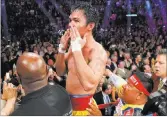  ?? SAM MORRIS/ LAS VEGAS REVIEW-JOURNAL ?? Manny Pacquiao thanks his fans after his welterweig­ht unificatio­n title loss Saturday to Floyd Mayweather Jr.