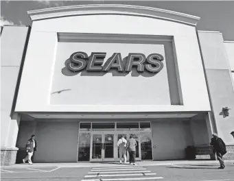  ?? AP FILE PHOTO ?? The expanded tire service deal with Amazon comes a few days after Sears Holdings announced that it would close roughly 5 percent of its remaining Sears and Kmart locations.