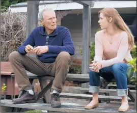  ??  ?? Clint Eastwood is an aging baseball scout and Amy Adams is his estranged daughter, who joins him on the road in “Trouble With the Curve.”