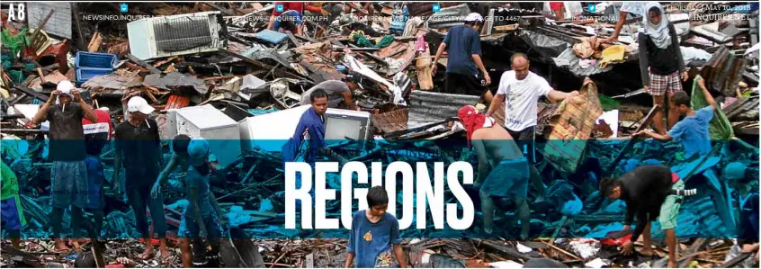  ?? —RICHARD REYES ?? DEVASTATIO­N Residents of Tacloban City sift through debris after Supertypho­on “Yolanda” hit Leyte province in November 2013.