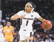  ?? Sean Rayford / Associated Press ?? South Carolina’s Zia Cooke hit four 3pointers and scored 20 points in a 6948 win over Tennessee.