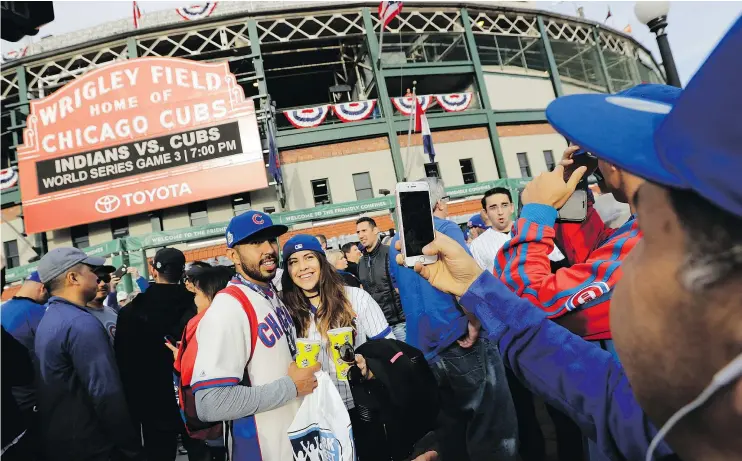  ?? — THE ASSOCIATED PRESS FILES ?? Fans will fill the stands in Wrigley Field on Monday to see the Chicago Cubs at home for the first time since they won the 2016 World Series last fall.
