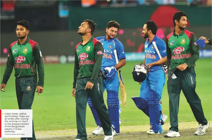  ?? Virendra Saklani/Gulf News ?? India’s Kedar Jadhav and Kuldeep Yadav are all smiles after scoring the winning run much to the disappoint­ment of the Bangladesh­i players in Dubai yesterday.