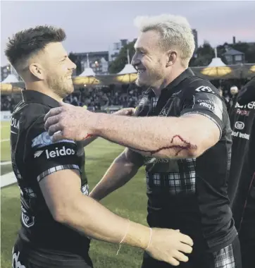  ??  ?? 0 Ali Price, left, and Stuart Hogg enjoy the moment following Glasgow’s victory over Ulster.