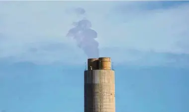  ?? Rick Bowmer/Associated Press ?? A smokestack stands at a coal plant in Delta, Utah. The Environmen­tal Protection Agency issued a final rule last week to restrict smokestack emissions from power plants and other industrial sources.