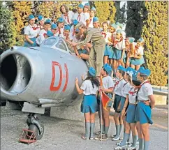  ??  ?? Russian pilot Yuri Shchelkaye­v telling Ukrainian children about the MIG-15 jet fighter at the Artek Internatio­nal Children’s Centre, Crimea in 1973