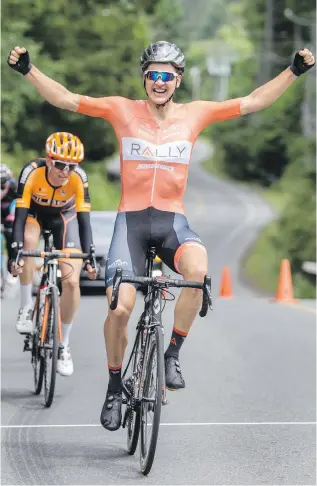  ?? DARREN STONE, TIMES COLONIST ?? Victoria’s Adam de Vos sprints across the finish line ahead of Nigel Ellsay in the 120-kilometre Schwalbe Road Race Classic through Metchosin on Saturday, part of the weekend’s Robert W. Cameron Law Cycling Series.