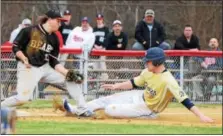  ?? AUSTIN HERTZOG - DIGITAL FIRST MEDIA ?? Boyertown’s Tyler Kreitz collects the throw from catcher Anthony Rota and tags out Spring-Ford’s Quinn McKenna at third base for a strikeout-throw out double play.