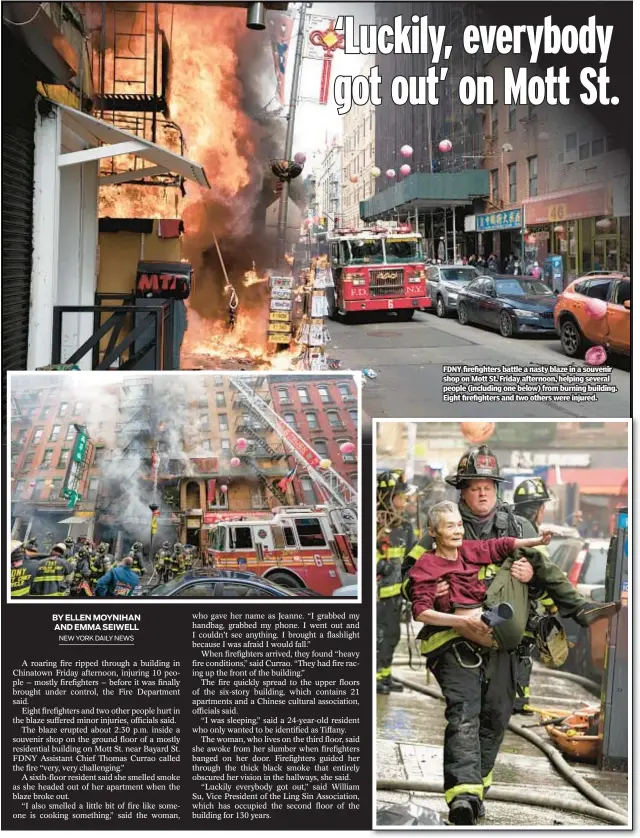  ?? ?? FDNY firefighte­rs battle a nasty blaze in a souvenir shop on Mott St. Friday afternoon, helping several people (including one below) from burning building. Eight firefighte­rs and two others were injured.