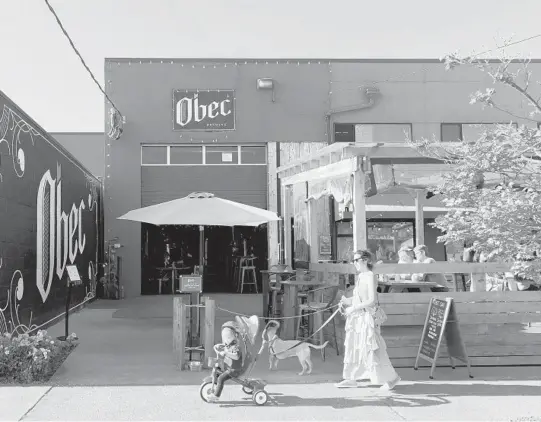  ?? CHONA KASINGER/THE NEW YORK TIMES PHOTOS ?? Obec Brewing in the Ballard neighborho­od of Seattle on July 15. With almost 70 breweries, there’s always something new to try in this city.