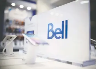  ?? BRENT LEWIN/ BLOOMBERG FILES ?? High-intensity holiday promotions by wireless and mobile phone companies like Bell are unusually muted this year compared with prior years, a bullish sign for revenue, says TD Securities.