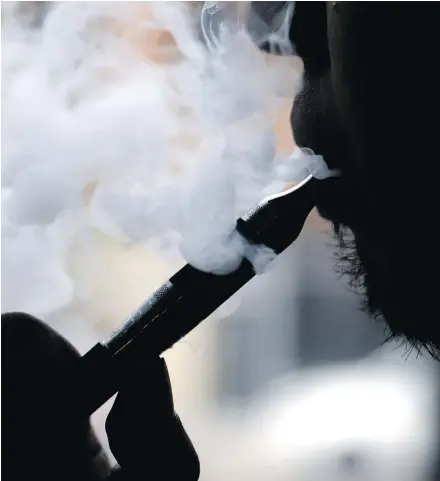  ?? — AP FILES ?? Research published in the journal BMJ found e-cigarette users were more likely to succeed in quitting for at least three months compared to non-users at eight per cent versus five per cent.