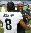  ?? MICHAEL REAVES — THE ASSOCIATED PRESS ?? Michigan State coach Mel Tucker hugs receiver Jalen Nailor after the Spartans defeated No. 24Miami on the road Saturday.