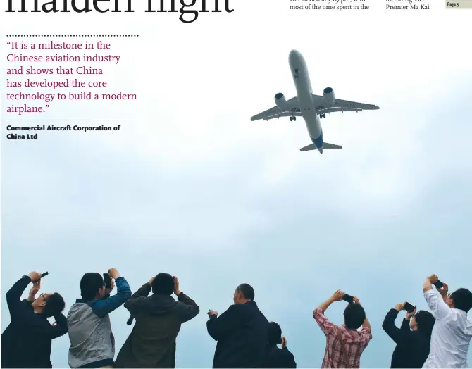  ??  ?? Spectators take pictures of the C919 which took off at 2 pm from the Shanghai Pudong Internatio­nal Airport. The aircraft with five crew members on board landed at 3:19 pm after a successful maiden flight.