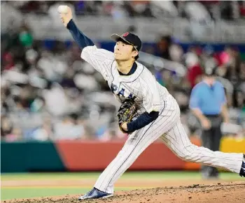  ?? Wilfredo Lee/associated Press ?? Prized free-agent pitcher Yoshinobu Yamamoto has reportedly agreed to a $325 million, 12-year deal with the Los Angeles Dodgers.