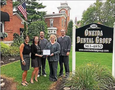  ?? PHOTO COURTESY GREATER ONEIDA CHAMBER OF COMMERCE ?? From left are chamber board members Kim Caro and Rachel Siderine, Dr. Craig DeCastro, Dr. Anne Russell-Brien, and Dr. Nathan Weires.