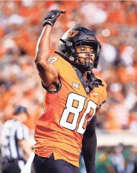  ?? SARAH PHIPPS/THE OKLAHOMAN ?? Oklahoma State receiver Brennan Presley says he’s hoping for more chances to throw the ball on trick plays after missing an opportunit­y last Saturday at Texas.