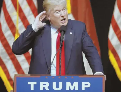  ?? AP PHOTO ?? ‘HER JUDGMENT IS HORRIBLE’: Republican Presidenti­al candidate Donald Trump pauses as he speaks at a rally in Raleigh, N.C., last night.