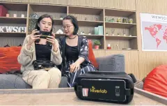  ??  ?? Seow Yun Rong (left) and Heather Seet are two of the creators of the VR simulation­s used by Girl, Talk.