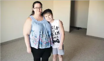  ?? TROY FLEECE ?? Angelique Pepin and her 11-year-old son, Sean, are preparing to move into a new apartment after their former home was destroyed by fire on Aug. 11. A friend has organized a fundraiser to help them resettle.