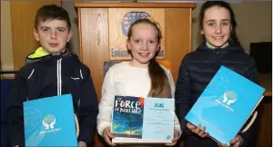  ??  ?? Adam Phylan, Caim NS, second, Molly Byrne, Ballindagg­in NS, winner, and Emma Reville, Clongeen NS, third (8-10years inclusive section).