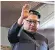  ??  ?? Kim Jong-un waves at the crowds enjoying a unique performanc­e by South Korean K-pop singers in Pyongyang, the North’s capital