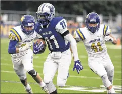  ?? DEBORAH CANNON / AMERICAN-STATESMAN ?? McCallum senior Andre Blakemore gained 256 yards on 32 carries in the Knights’ victory over Anderson.
