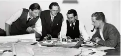  ??  ?? Hugh Casson, second left, and colleagues discuss the plans