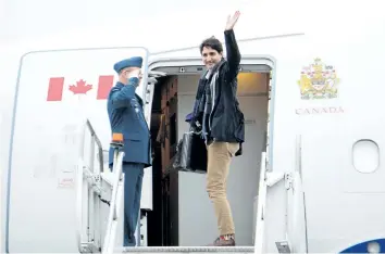  ?? SEAN KILPATRICK/ THE CANADIAN PRESS ?? Prime Minister Justin Trudeau departs Vancouver, B. C. on Saturday, on route to China.