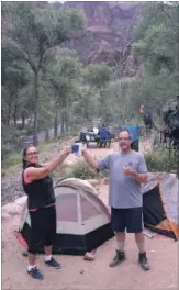  ??  ?? The writer’s wife and brother-in-law celebrate after their seven-hour hike down to into the canyon.