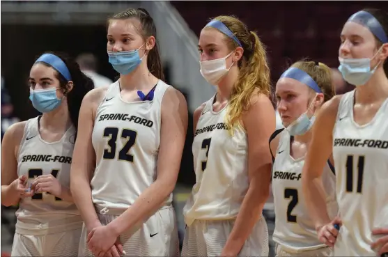  ?? AUSTIN HERTZOG - MEDIANEWS GROUP ?? Spring-Ford seniors, from left, Mac Maloney, Hailey Hudak, Lucy Olsen, Abbey Boyer and Emily Tiffan watch as North Allegheny receives the PIAA championsh­ip trophy after Friday’s final.