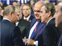  ?? Foto Reuters ?? Ruski predsednik Vladimir Putin in Gerhard Schröder sta v dobrih odnosih od takrat, ko je Schröder vodil Nemčijo.