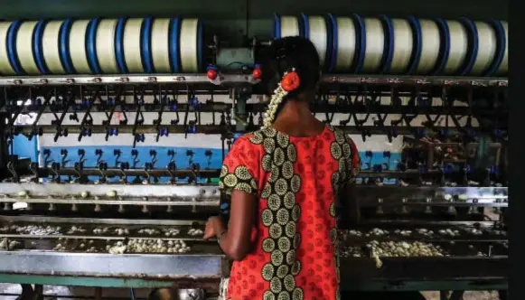  ?? REEVA MISRA/THE WASHINGTON POST ?? An underage labourer works in a silk factory in Sidlaghatt­a, India. According to estimates, 33 million children in India from ages 5 to 18 are working — and almost one-third of those are under 15.