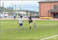  ?? Tim Godbee ?? Calhoun sophomore midfielder Jacob Dupree tries to secure the ball while a Coahulla Creek defender closes in on him. The Yellow Jackets will host Sonoravill­e Thursday night in a soccer doublehead­er at Calhoun High, beginning at 5 p.m.