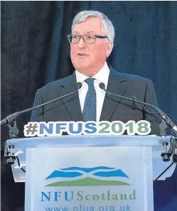  ?? Picture: Paul Watt. ?? Rural economy secretary Fergus Ewing told farmers that the Scottish Government believed the primary role of agricultur­e was to produce food, and that Scottish farmers already do a lot of work to benefit the environmen­t.