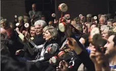  ??  ?? The Guangdong National Orchestra of China will be one of the four folk music orchestras to join the upcoming Grand Chinese New Year Concert tour in Europe. Drummer Chen Zuohui performs at a 2008 Chinese New Year concert. Above right: Audiences attend a...