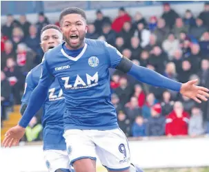  ?? Peter Hilton Photograph­y ?? Scott Wilson toasts his goal against Crewe