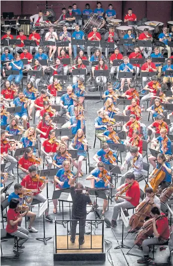  ??  ?? JOINING HANDS: The National Youth Orchestra of United States performs with the National Youth Orchestra of China. The young musicians are enjoying a multi-night run at Carnegie Hall.