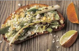  ?? PICTURE: THE WASHINGTON POST ?? Grilled Corn and Scallion Toast With Cilantro Crema.