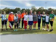  ?? ?? Helen with her fellow competitor­s in the javelin event