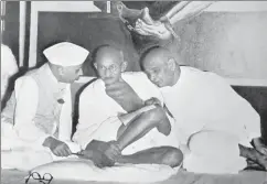  ?? UIG VIA GETTY IMAGES ?? ▪ MK Gandhi with Vallabhbha­i Patel and Jawaharlal Nehru, 1947