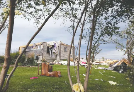  ?? JEAN LEVAC ?? Above, one of the many homes on PorcupineT­rail destroyed by the Ottawa-Gatineau tornadoes last year.