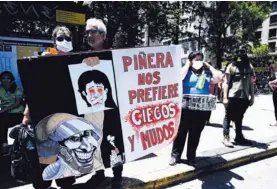  ?? AFP ?? Manifestan­tes volvieron a repudiar ayer al presidente chileno, Sebastián Piñera, en la capital, Santiago.
